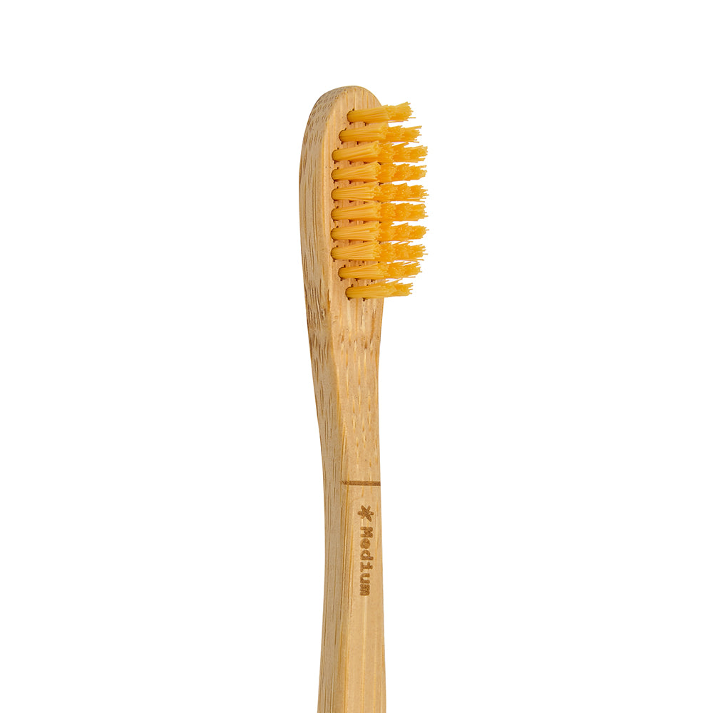Eco biobased bamboo toothbrush with BPA-free nylon bristles in soft, medium, firm, and kid's options