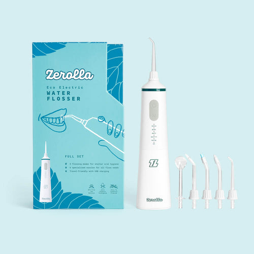 Portable electric water flosser with high-pressure jets and multiple nozzles for deep cleaning