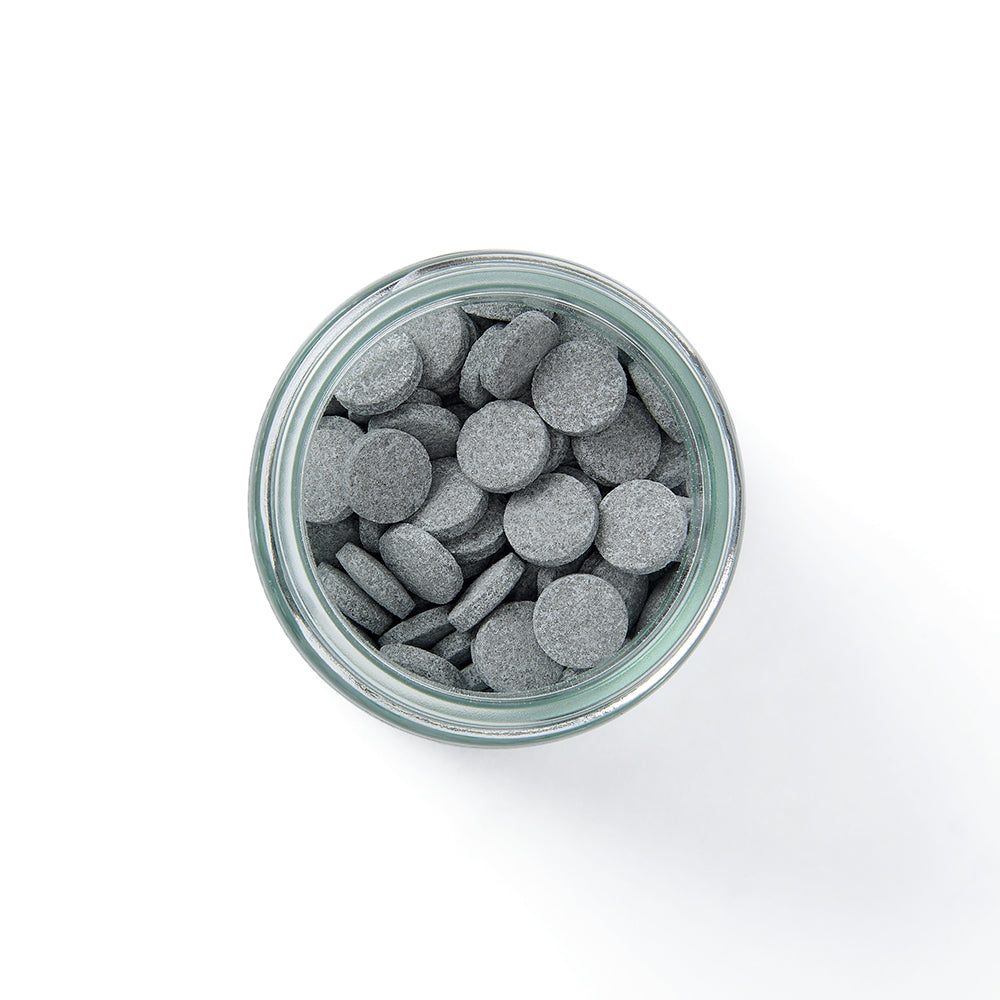 Close-up of Eco Natural Mouthwash Tablets with fresh breath benefits and eco-friendly packaging