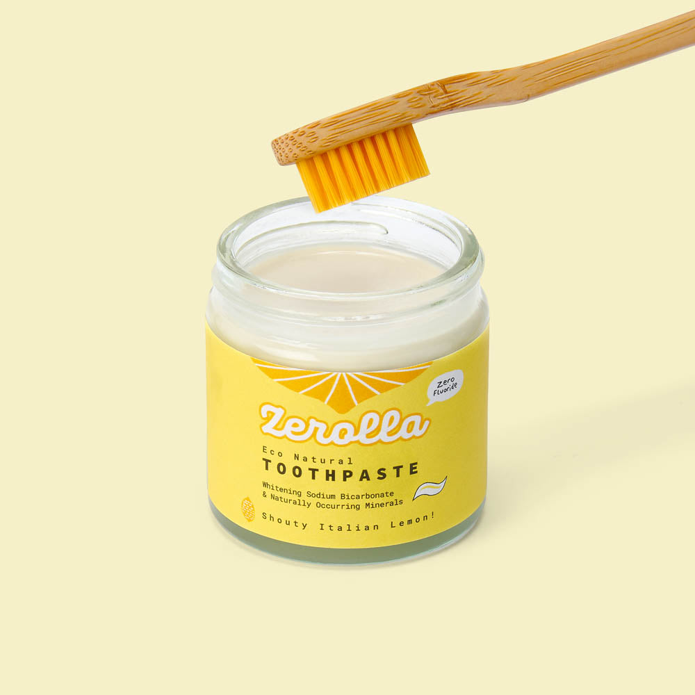 Natural toothpaste with whitening sodium bicarbonate and organic essential oils in zero-waste packaging