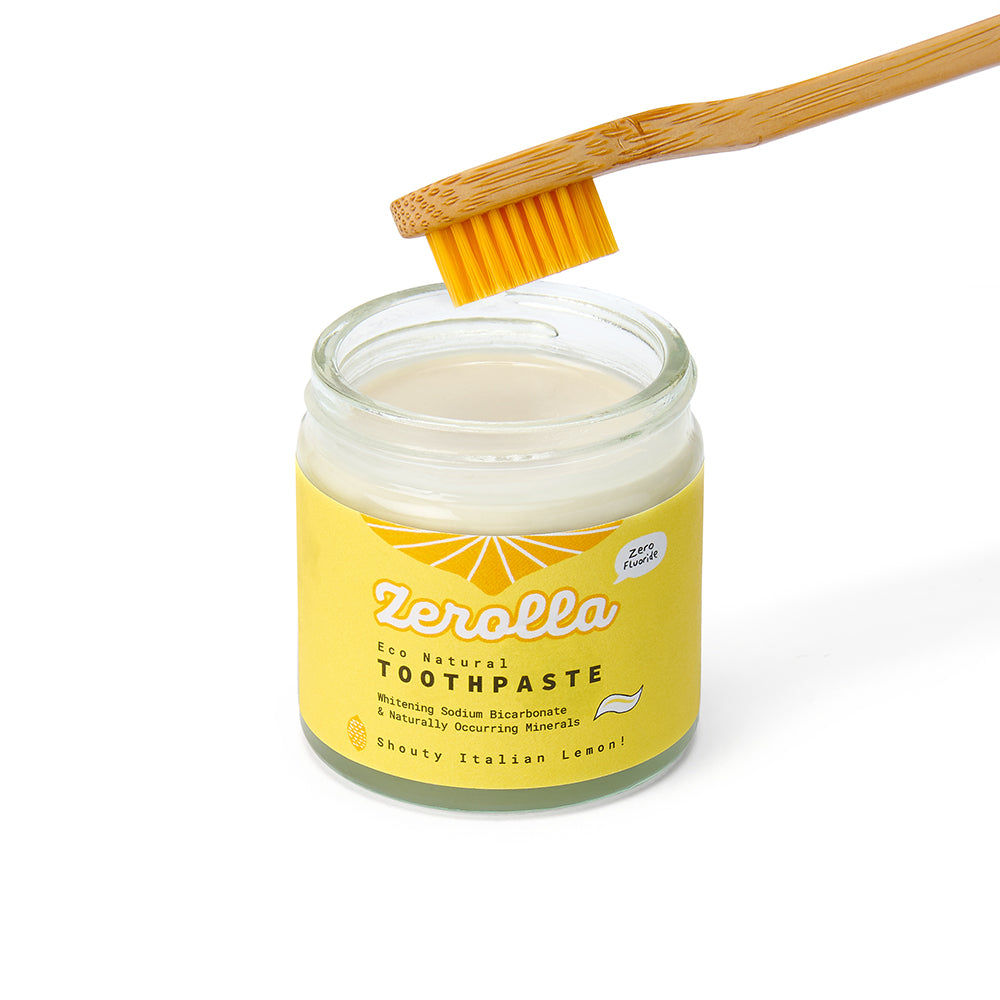 Natural toothpaste with whitening sodium bicarbonate and organic essential oils in zero-waste packaging