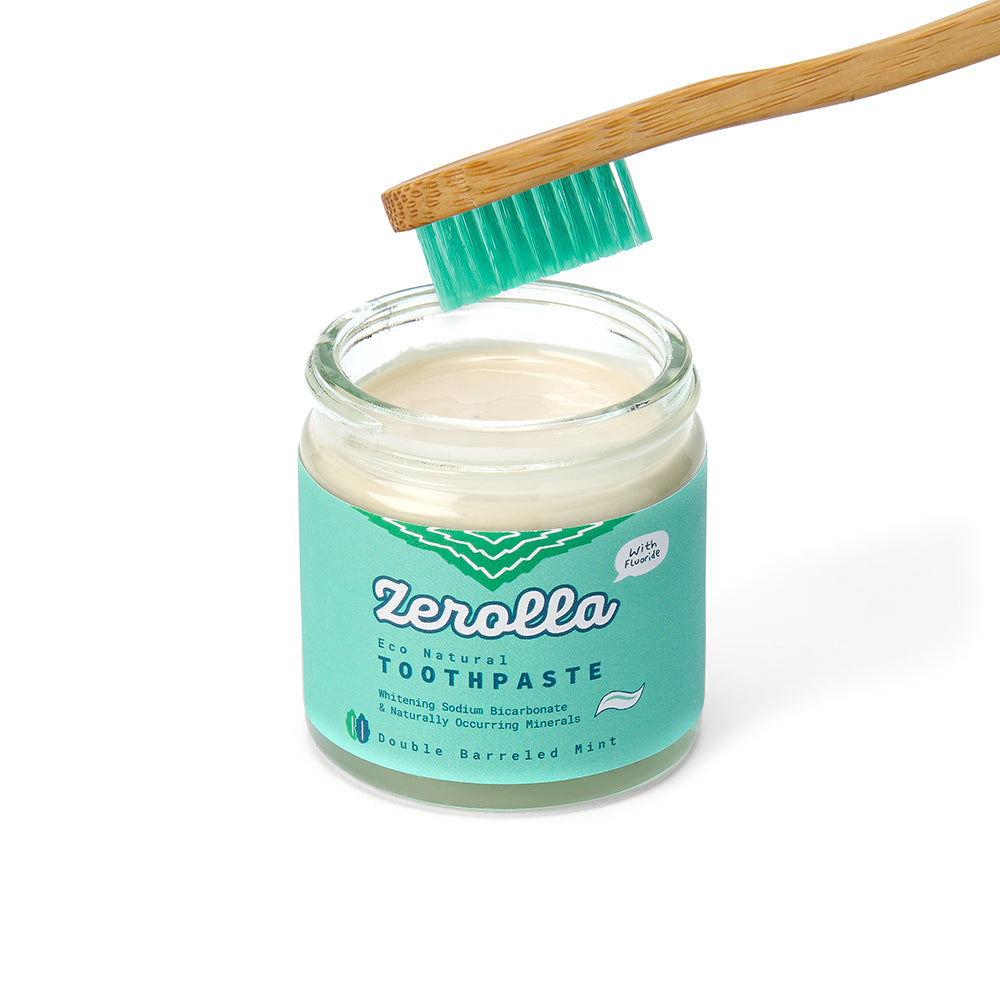 Eco natural toothpaste with whitening sodium bicarbonate and organic oils in zero-waste packaging