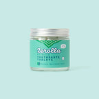Eco natural toothpaste tablets in a plastic-free jar with whitening and plaque-removing ingredients