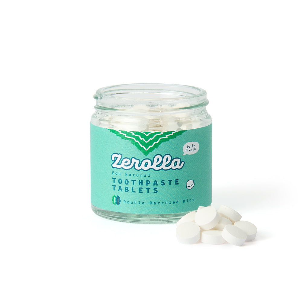 Eco natural toothpaste tablets in a plastic-free jar with whitening and plaque-removing ingredients