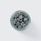 Eco-friendly Toothpaste Tablets in plastic-free packaging with whitening and plaque removal benefits